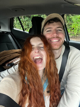 ugc Couple Takes Selfie inside car on roadtrip