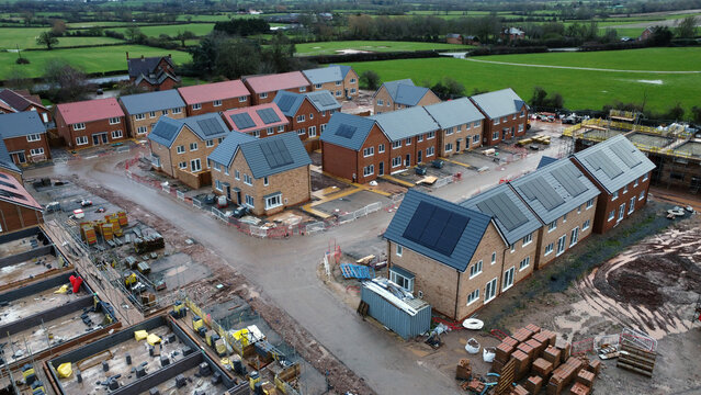 Aerial view of new homes under construction on a housing estate