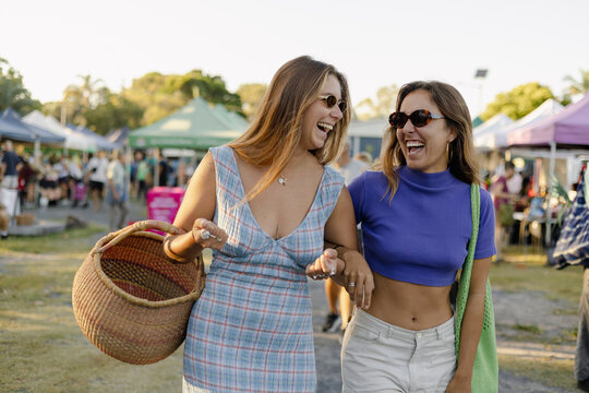 Friends Walking Through Farmers Market in Byron Bay, Australia