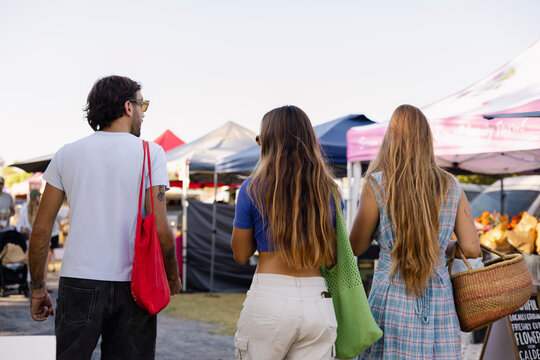Friends Walking Through Farmers Market in Byron Bay, Australia