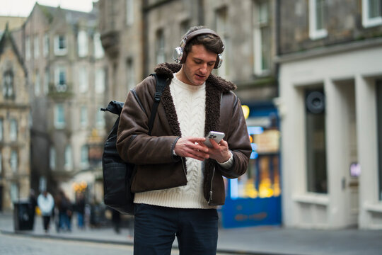 Man enjoys music outside
