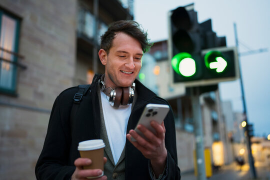 Using smartphone at green traffic light