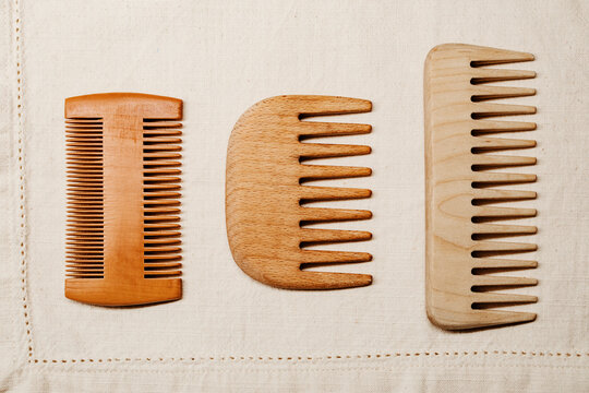 Wooden Combs Arranged on Fabric Surface for Display
