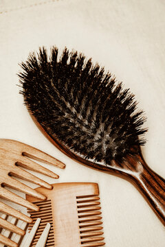 Hair Brush on a Light Surface in a Simple Setting