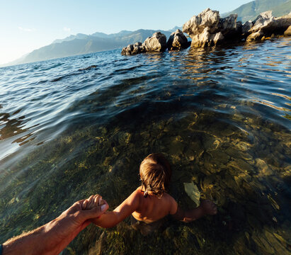 Father and baby going to sea