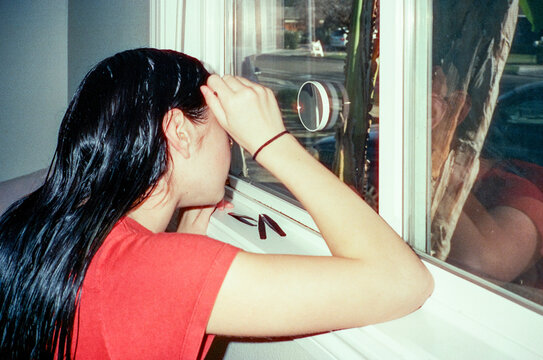 Girl Plucking Eyebrows 