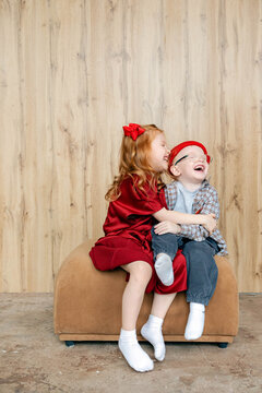 Children laughing while sitting together