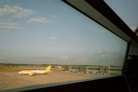 View of Airport Runway With Airplanes