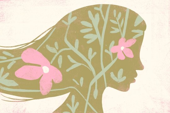 Female silhouette with floral pattern