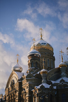 Snow-Covered Russian Orthodox Cathedral With Golden Onion Domes