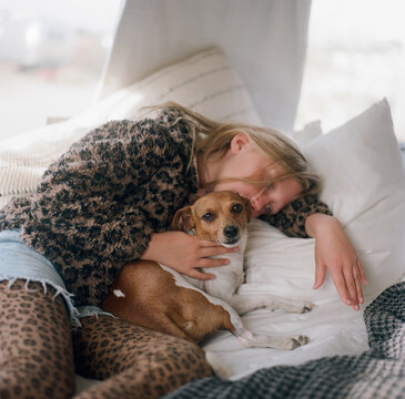 Girl with dog in camper