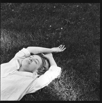 Woman Resting in Grass