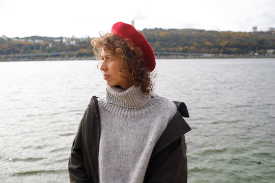 woman walking by the water
