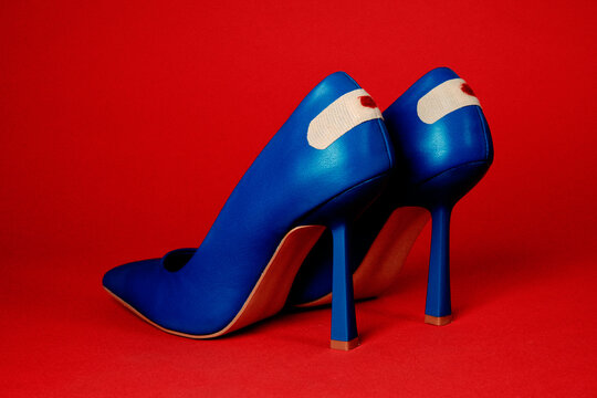 stilettos with blood-stained heel bandages