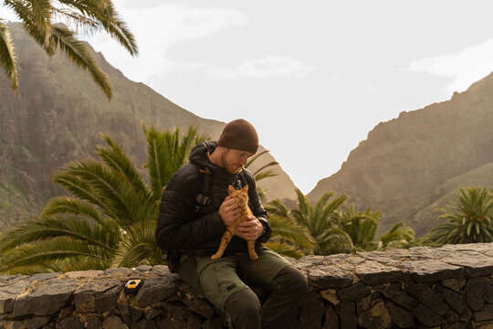 Man holding cat viewpoint
