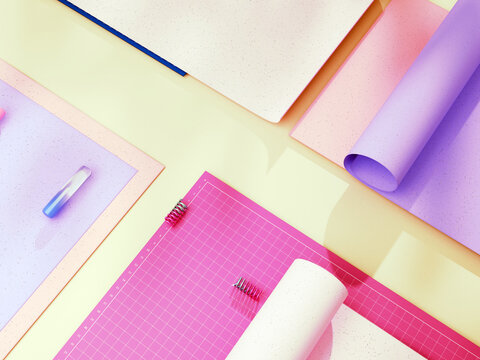 Colorful Papers and Materials Arranged on a Table for Crafting