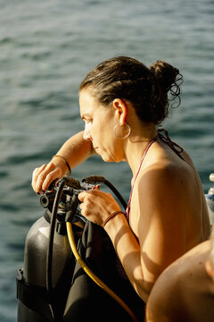 Diver Closing Scuba Tank Valve After Dive Koh Tao, Thailand