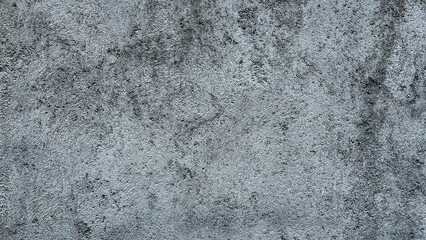 Fototapeta premium Texture concrete wall of light grey color cement texture background.Grey pastel rough crack cement texture stone concrete,rock plastered stucco wall; painted flat fade background. Side view. close up.