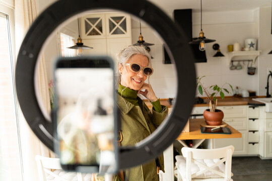 Senior recording fashion vlog