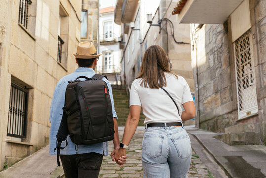 Couple Exploring Historic European Street
