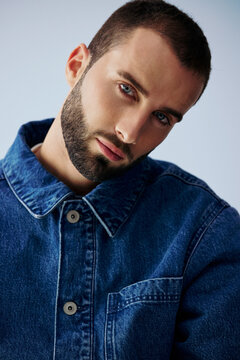 Young Man in Denim Shirt With Short Hair and Beard