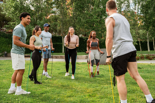 Group outdoor fitness with resistance bands