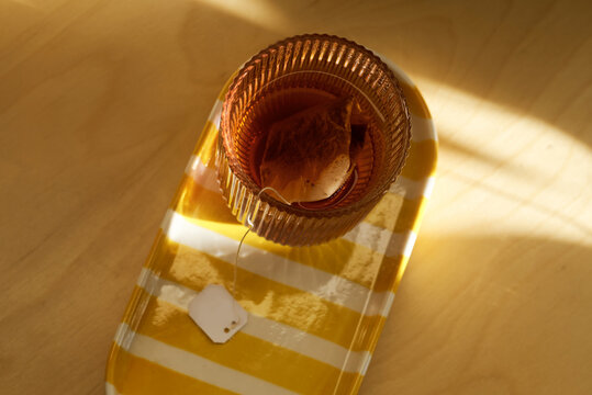 From above view on cup of tea with tea bag