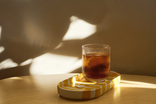 Cozy moment with glass cup of tea