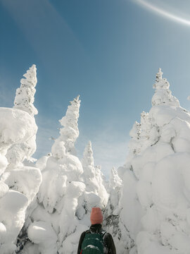 UGC of of young woman n on a winter hike in New Hampshire, USA