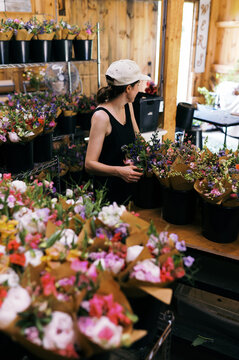 florist making bulk order of bouquets