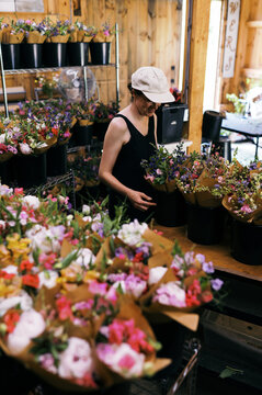 florist making bulk order of bouquets