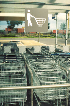 Shopping Carts Behind Glass