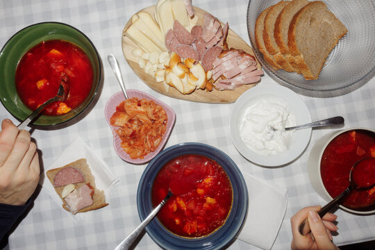 plates of borscht soup on the table