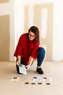 Interior designer deciding options for space renovation 