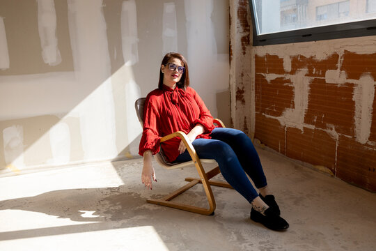 portrait of interior designer in space in construction
