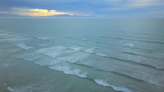 Aerial Shot of a shoreline just after sunrise. Muizenberg, Cape Town