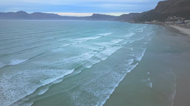 Aerial shot of Muizenberg&rsquo;s shoreline and False Bay.