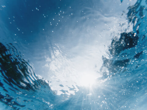 Abstract underwater view from below in a sea
