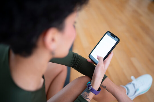 Using smartphone while sitting on floor