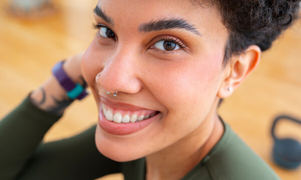 Smiling woman during workout session in gym