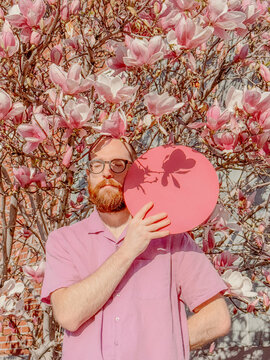 Man poses with circle