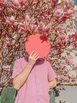 Faceless man with circle