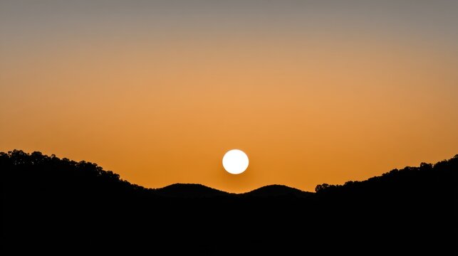Minimalist Horizontal Sunset Landscape Hills Trees Silhouette Orange To Gray Brown Gradient Sky Centered Circular White Sun Lower Third Horizontal Silhouette Solid Black Foreground