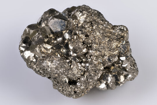Crystal cluster showcasing refined cubic facets. Sample of pyrite featuring sharp cubic geometries and highresolution textures suitable for geological inspection