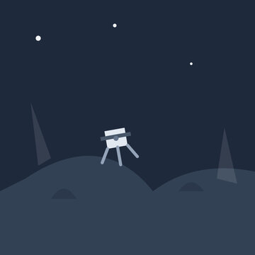 A man standing on top of a mountain at night