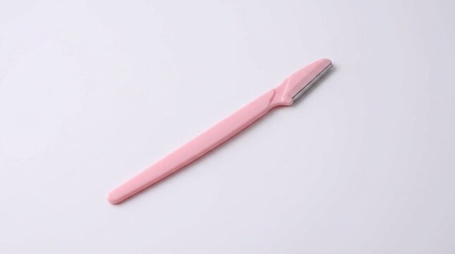 Pink Eyebrow Razor and Shaper Isolated on White Background, Professional Face Dermaplaning Tool for Women, Precision Eyebrow Trimmer with Safety Cover, Beauty Grooming Accessory for Facial Hair
