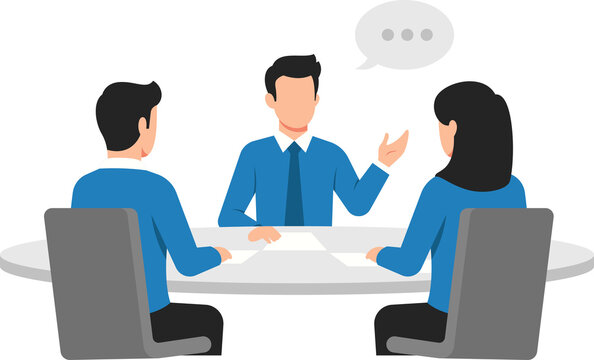 Business meeting with three people discussing at a table