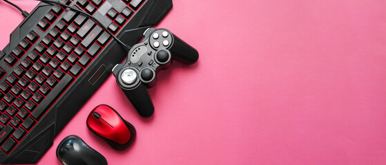 Fototapeta premium Modern gaming accessories on color background