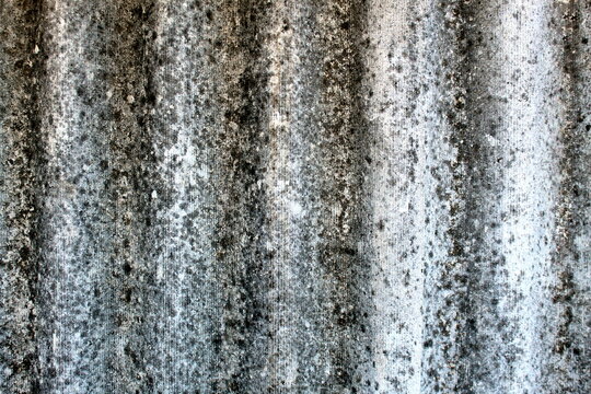 Abstract gray slate texture with vertical shadow.