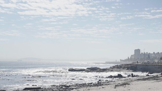 Sea Point Beach in the early afternoon sunlight.